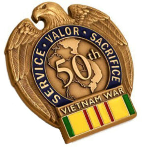 gold metal pin recognizing the 50th anniversary of the Vietnam War.