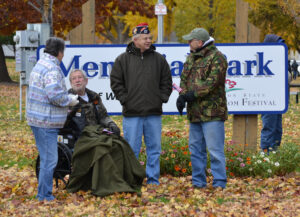 Larry with veterans at the local Memorial Park on Veterans Day.