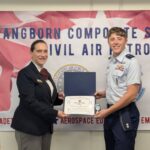 Sarah Simonson presents VFW CAP Cadet Officer Citation to Dawson Brender.