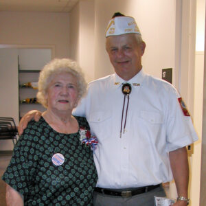 Larry Strozyk in VFW uniform with Hellen Link at the opening of the CBOC