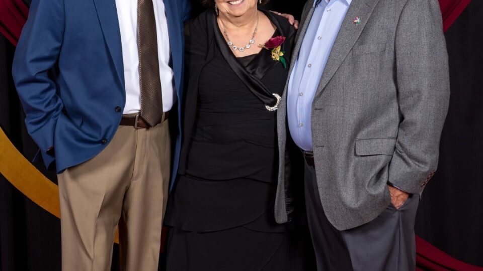 Cancer hero Becky, center, with Brad Pieratt and Steve Johnson