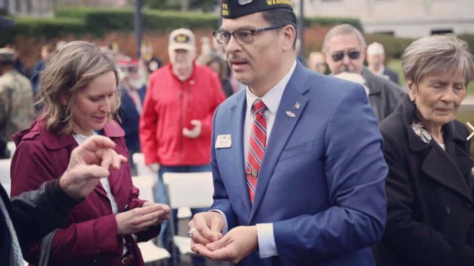 Paul Herrera at US Capital distributing pins with Congresswoman Kim Schreier