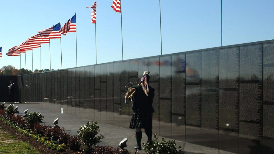 John Nugent, Vietnam veteran, plays the bagpipes as a part of the opening ceremony at the Dignity Memorial Vietnam Wall at Mt. Trashmore Park in Virginia Beach, Va.